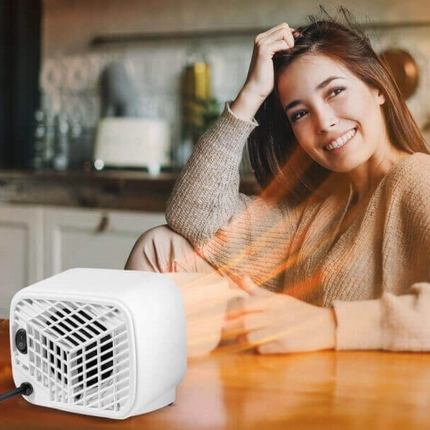 woman feeling happy using Blaux Heater 450W